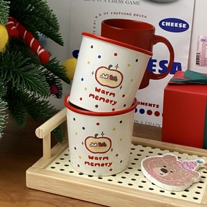Cartoon apple ceramic mug set with cute bear illustrations for coffee and milk