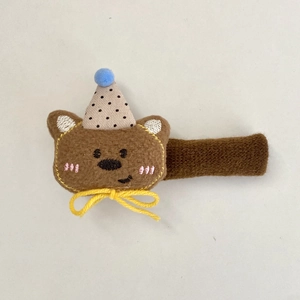 Cute brown plush bear door handle cover with polka dot party hat and yellow bow