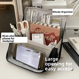 Black fabric storage bag detail showing smartphone stand and large capacity grid layout