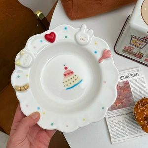 Cute ceramic dessert plate with 3D relief rabbit and cat motifs and wavy edges