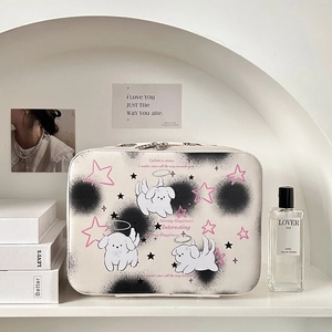 Detail view of large PU leather makeup bag featuring cute cartoon puppies and star patterns