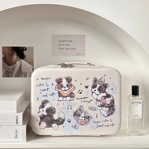 Detail view of large cream bear makeup bag with cute dog prints and top handle