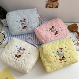 Cute puppy embroidery makeup bags with heart quilting and handle in four soft pastel colors