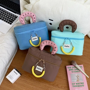 Waterproof travel cosmetic bag with numbered handle and stylish Hello label design