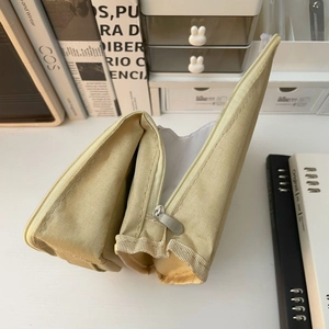 Large capacity standing beige makeup bag with multiple compartments for cosmetics storage