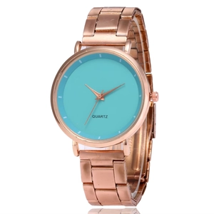 Close-up of rose gold steel watch with a vibrant turquoise dial and quartz movement