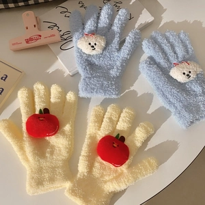 Detail of plush coral fleece gloves featuring cute puppy and apple patches for winter warmth