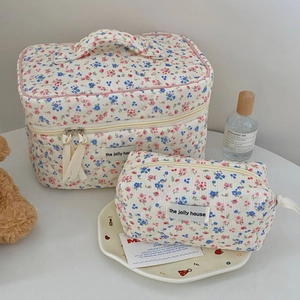 Floral quilted corduroy makeup bag set with top handle and ivory ribbon detail