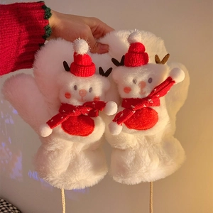 Close-up of plush white mittens with 3D Christmas bear, red hat and cozy scarf detail