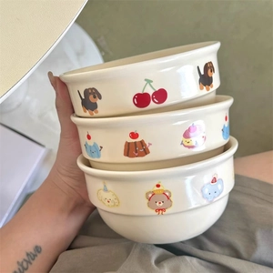 Three-piece ceramic bowl set with hand-painted cream cartoon patterns for home dining