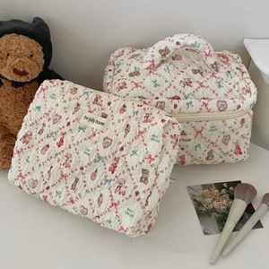 Floral quilted cosmetic bag set with cute bear patterns and makeup brush accessories