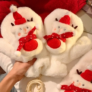 Detail of plush white Christmas mittens with cute 3D snowman and reindeer decorations