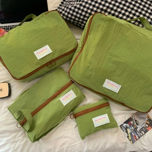 Green plaid nylon travel organizer set including four bags for suitcase packing