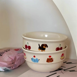 Stack of two cream ceramic bowls with cute cartoon cherry and dachshund illustrations