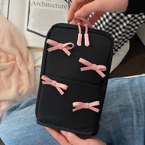 Cute black makeup bag with pink bows and large capacity storage for cosmetics