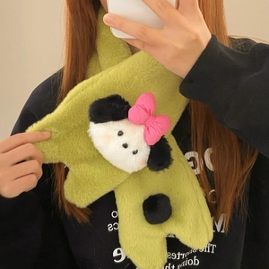 Detail of green plush scarf featuring a cute white cartoon dog with a pink bow