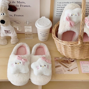 Cartoon cat plush slippers with pink bow and non-slip sole for indoor winter warmth