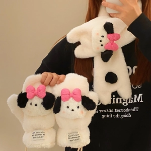 Detail of plush white puppy winter gloves with cute 3D ears and pink bow decoration