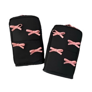 Cute black cosmetic bags set with pink bows and zippers for makeup and stationery storage