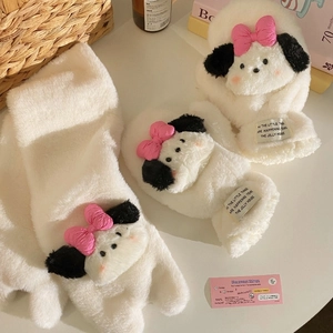 Detailed shot of plush white puppy scarf with cute 3D ears and pink bow decoration
