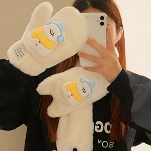 Detailed view of white plush winter gloves and scarf featuring cute snowman patches