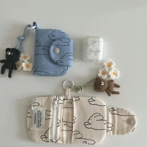 Floral canvas coin purse with cloud pattern and cute knit bear charms in blue and beige