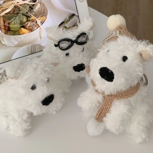 Detailed plush Westie dog keychains with cozy hats, goggles, and knitted scarves