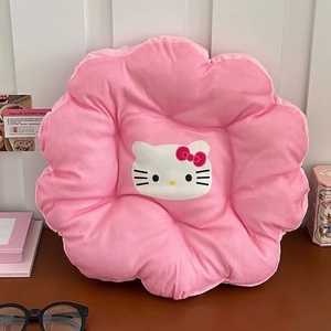 Close-up of pink flower-shaped chair cushion with cute cartoon character embroidery