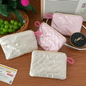 Quilted heart and bow mini pouch sets in pink and white with satin finish
