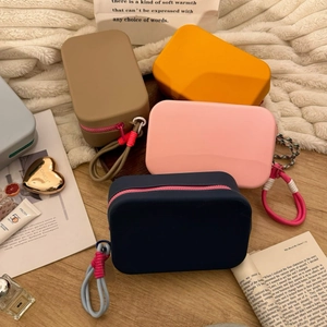 Waterproof silicone makeup pouch set in four colors for travel and small item storage