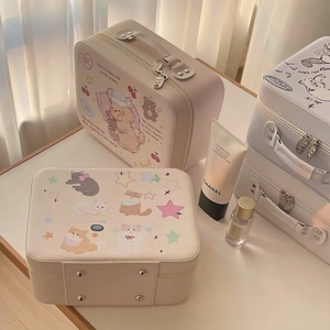 Detail of cute cartoon cosmetic case with leather handle, double zippers and pattern