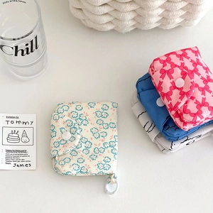 Floral fabric coin pouches with snap buttons and portable clips for organization