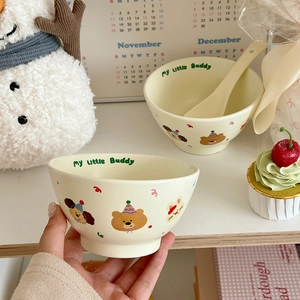 Detailed view of a cream ceramic bowl with cute cartoon animals and My Little Buddy text