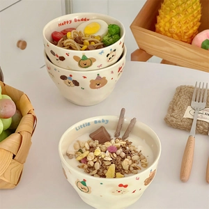 Cute cream-colored handmade ceramic bowl set with cartoon animals and matte finish
