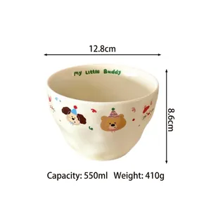 Detail of cream ceramic bowl featuring my little Buddy text and cartoon bear patterns