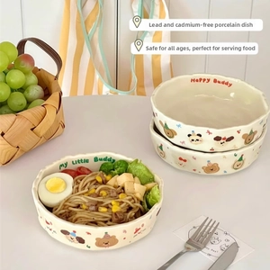 Detail of cream ceramic plate with cute cartoon bear pattern and soft matte finish