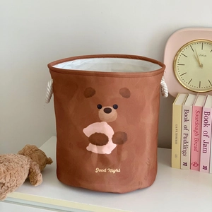 Detail of cartoon bear storage bin featuring thick canvas and sturdy cotton rope handles