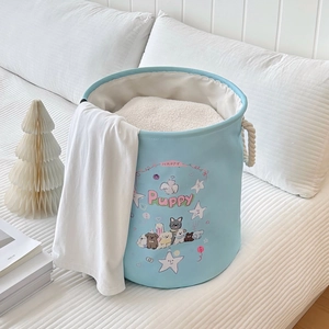 Blue laundry basket with cartoon puppy design and durable rope handles for home storage