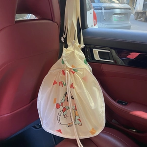 Car seat back organizer featuring Crayon Shin-chan cartoon design with drawstring closure