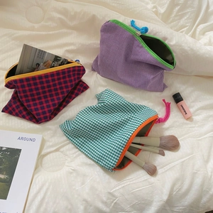 Large capacity checkered makeup bags in red, purple, and green with zipper closure