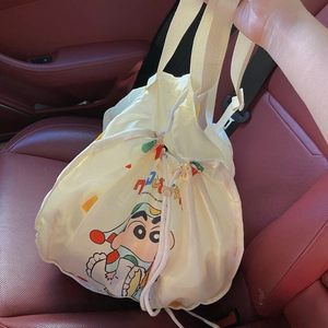 Detail of cartoon drawstring tote bag with character print on car seat