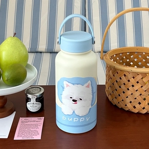 Detail of cute puppy illustration on a cream and blue portable insulated water bottle