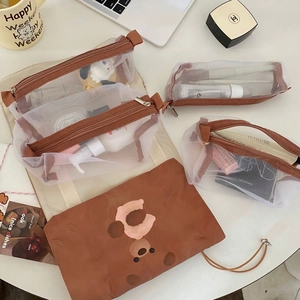 4-in-1 detachable travel toiletry bag with brown bear print and mesh makeup pouches