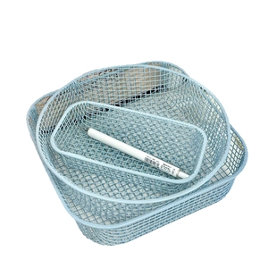 Set of three light blue minimalist iron mesh desktop storage baskets for stationery