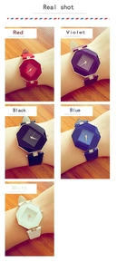 Detail of octagonal quartz watch dials with leather straps and rhinestone buckles