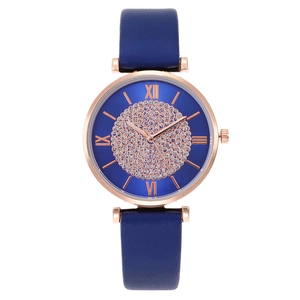Montre femme en cuir bleu avec boîtier en or rose et cadran orné de cristaux brillants