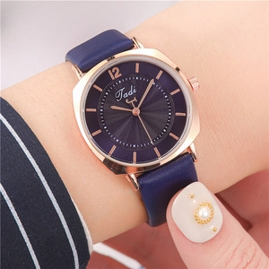 Women's quartz watch with dark blue leather strap and rose gold square dial display