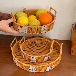Three sizes of woven storage baskets with dual handles and cute cartoon animal details