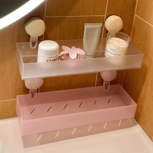Detailed close-up of a two-tier matte suction cup bathroom shelf with drainage holes
