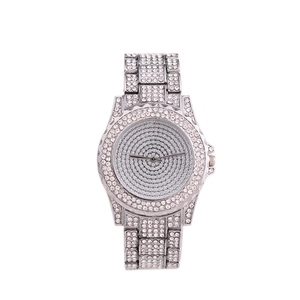 Detailed view of the luxury full diamond set watch with shimmering silver rhinestone band